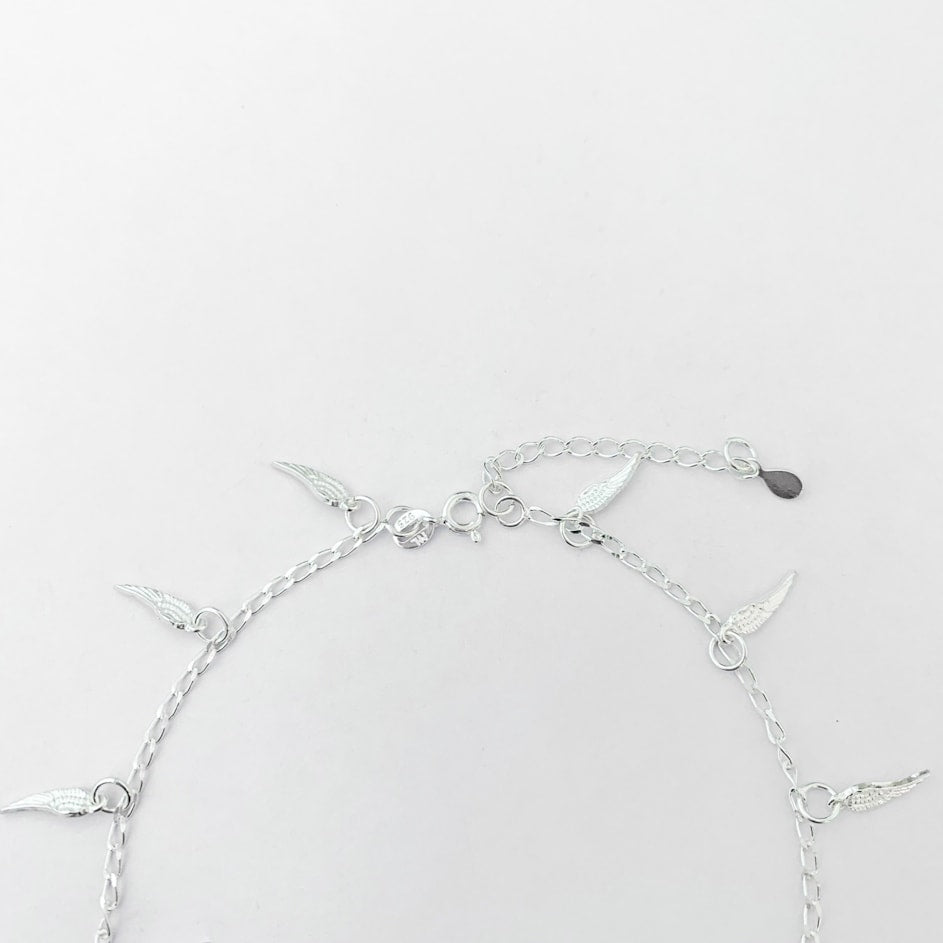 Tornozeleira de Asas